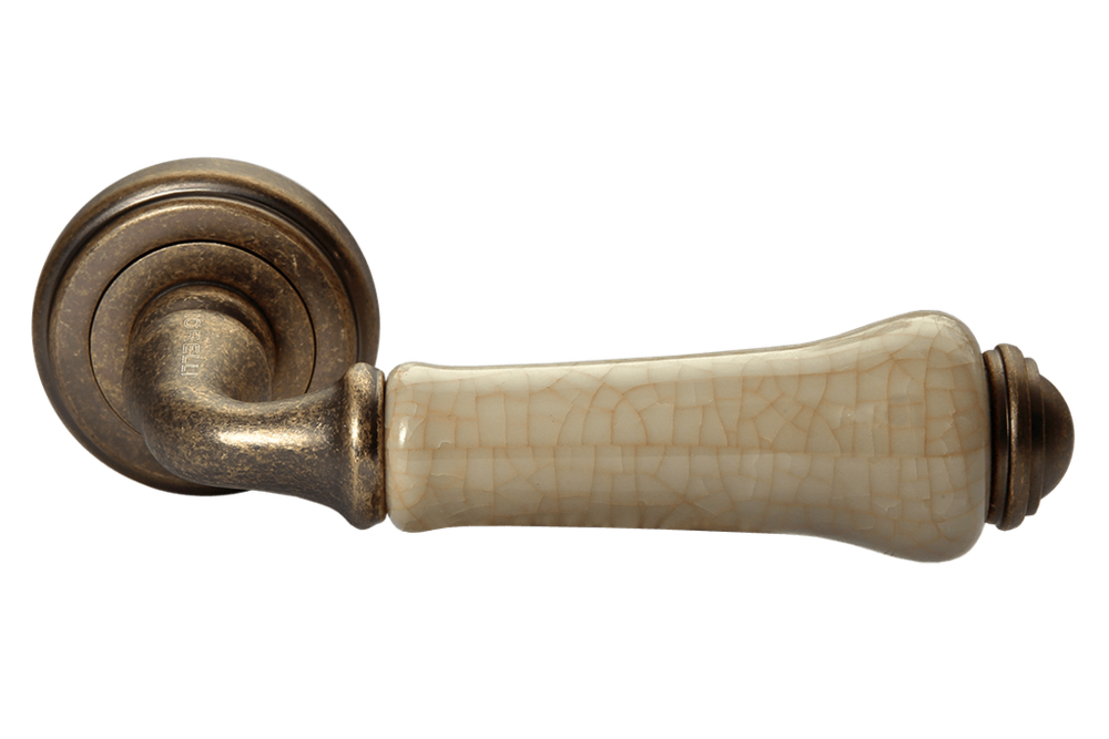 Ручка дверная на круглой розетке UMBERTO MH-41-CLASSIC OMB/CH старая матовая бронза/шампань